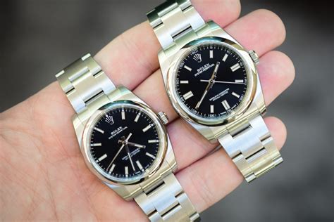 rolex oyster black dial gilt|rolex 34mm vs 36mm.